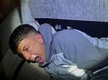 Moment drug dealer screams in terror as he's arrested by police while asleep as gang that flooded towns with cocaine and heroin is jailed