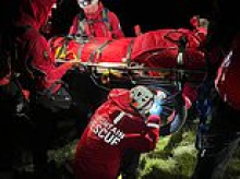 Injured pensioner, 77, and his grandson are rescued in late-night mountain operation... thanks to his phone's emergency SOS setting