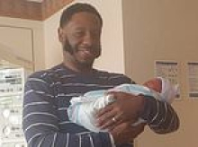Lindsay Clancy lone holdout juror shares heartwarming photo with his newborn daughter as fundraiser rakes in a small fortune