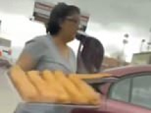 Stomach-churning video shows woman lift uncovered trays of bread out of trunk of her car and cart them into Midwest Subway store