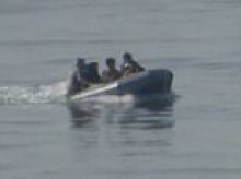 Security breach as dinghy evades Border Force and lands at Folkestone - with some migrants 'fleeing before police arrive'