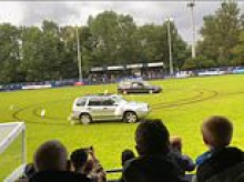 Five men charged over driving a HEARSE onto football pitch - after stunt caused non-league match to be abandoned