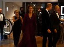 That was close! Moment Princess of Wales narrowly avoids being tripped up at premiere of Tom Cruise's Digger - after charity boss accidentally stands on the back of her gown
