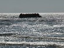 Woman 'is gang raped on migrant dinghy during Atlantic crossing': Three men are arrested