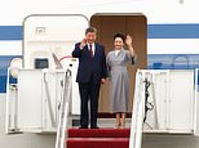 Trump visibly WINCES at roaring military flyover during stone-faced Xi's red carpet welcome - the same treatment he once mocked Obama for