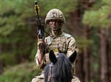 Can't stop the cavalry! British army turns to horses to travel silently and unseen in the age of drone warfare