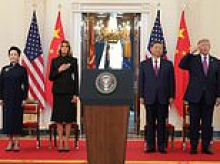 Skirmish between US and Chinese press breaks out forcing Secret Service to step in as Trump kicks off Xi Jinping charm offensive