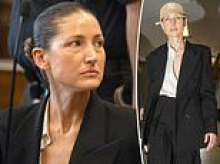Strutting A-list fashion designer in daring outfit suffers frenzied courthouse MALFUNCTION moments after appearing on charges of running sweatshop