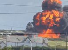 Crashed Hawk jet 'was steered into open field to avoid built up areas' before two RAF pilots ejected out of aircraft as it plummeted to the ground