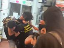 Feral teens who leaped over McDonald's counter to attack staff are charged with HATE crime