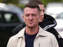 Tommy Robinson arrives at court to support anti-migrant activist 'Danny Tommo' after he was charged with criminal damage for slashing Channel dinghy