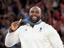 Black French judo star is bombarded with racist abuse sparking police probe after saying he was 'freaked out' by rise of the hard-right