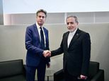 Ed Miliband condemned for shaking hands with Iran minister at 'propaganda win' UN meeting as British couple are 'held hostage'