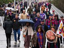 Weather delivers cruel blow to Brisbane fans making last minute trip to Melbourne for AFL Grand Final