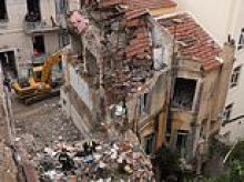 Fears grow for British pensioner, 78, last seen on balcony of Athens building destroyed by blast as rescuers pull bodies from rubble