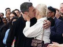 Andy Burnham puts wife centre stage and dishes out kisses on eve of his first Labour conference - as she quits job to be full-time 'first lady'