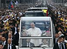 Pope Leo's mass appeal: American pontiff is met by 600,000 crowd as he arrives for outdoor service in Paris before heading for Lourdes