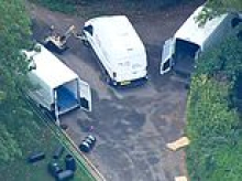 Local hero alerted cops to RAF terror threat when she saw several men 'acting suspiciously' - as bomb squad probes three white vans 'filled with explosives and chemicals'