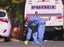 Rookie cop is hailed an 'absolute hero' for chasing down alleged knifeman after being stabbed in the neck