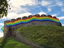 Fury as town's historic castle is draped in giant rainbow flag during Pride festival celebrations