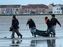 At least three UK-bound migrants including boy, 10, and two women are killed as mega-dinghy capsizes off Calais