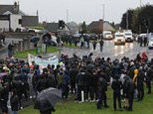 Members of Orange Order are stopped by police at 4am as they attempt to set off on loyalist parade again - a day after they were blocked by protesters