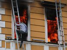 Russian drone slams into Kyiv's National Academy of Sciences building with trapped victims climbing out of windows to escape inferno