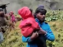 Moment Nepalese families run for their lives as landslide carries away homes weeks after 'tsunami' flood killed 1,400