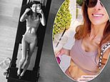 Luisa Zissman poses in a crop top as she works up a sweat at reformer Pilates after 'skinny shaming' row