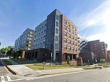 Female student falls eight floors into courtyard of luxury accommodation and SURVIVES