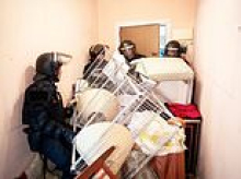 Spanish pensioner, 87, is allowed to return home after she was evicted by riot cops after investment brothers pushed her rent up by 275%, sparking nationwide fury