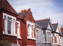 Cash-strapped households are taking on debt at the fastest pace in 33 years