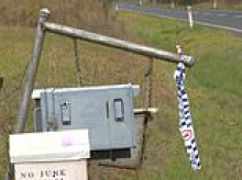 Neighbour accused of murdering father and son who travelled interstate to settle estate in rural Australia