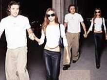 Brooklyn Beckham and Nicola Peltz walk hand in hand as they arrive in the French capital for Paris Fashion Week - just days before estranged mum Victoria's show