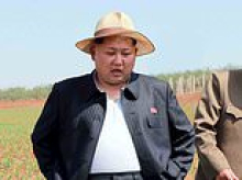 Lobster and steak-loving Kim Jong-un is 'extremely obese' after ballooning to 310lb and at 'high risk of cardiovascular disease', spies in Seoul reveal