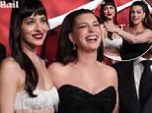 Dakota Johnson appears to run out of patience and says 'I'm gonna leave' as Anne Hathaway takes charge and directs photographers on Verity red carpet