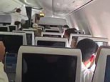 Terrifying footage shows flydubai jet nosediving and men charging towards the cockpit as passengers scream during 'pilot hijack knife fight'
