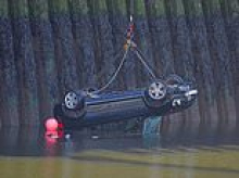 Car that plunged into River Wear and killed three teenagers is pulled from water after driver 'who was in the wrong gear' crashed through metal barrier