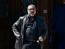 Ex-director of Britain's top A-level school admits stealing £5million from the £70,000-a-year private college as his 'tiger mum' wife prepares to face trial