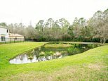 Boy close to celebrating his second birthday dies after falling into pond at family's Florida property as they swear he wasn't left alone for 'more than 10 minutes'