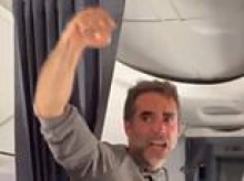 Moment flydubai hero punches the air and tells cheering passengers 'we won' after 'hijack pilot' was overpowered