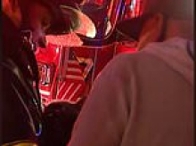 Heartwarming moment as huge group of firefighters save elderly cat from five alarm blaze