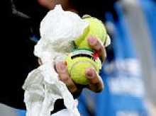 Ireland's clash with Austria is HALTED as furious fans throw hundreds of tennis balls onto the pitch in protest at matches against Israel going ahead
