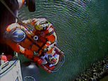 Fisherman who became trapped under massive boulder reveals he used Siri to call 911 as he describes miracle survival