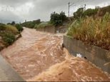 Wild storms trigger 'extraordinary danger' red alert warning to stay indoors in Spanish tourism hotspot as flash floods turn roads into raging rivers