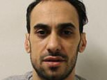 Algerian asylum seeker who stole 13 designer handbags from John Lewis after spitting on security guard is jailed for two years