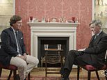 Moment Tucker Carlson tells an incredulous Jacob-Rees Mogg that Britain would have been better off LOSING World War Two - but says he is not a Nazi supporter