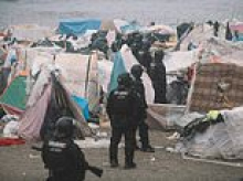 Spanish police clear Ceuta beach where 3,000 migrants had set up camp ahead of visit by royal family