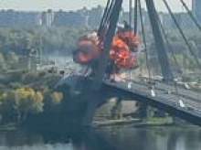 Putin launches strikes on Kyiv while German Chancellor Merz visits Ukrainian capital in show of support for Zelensky