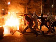 Protesters battle Spanish police as demonstrations over the country's housing crisis escalate into violence hours after socialist PM announced snap election